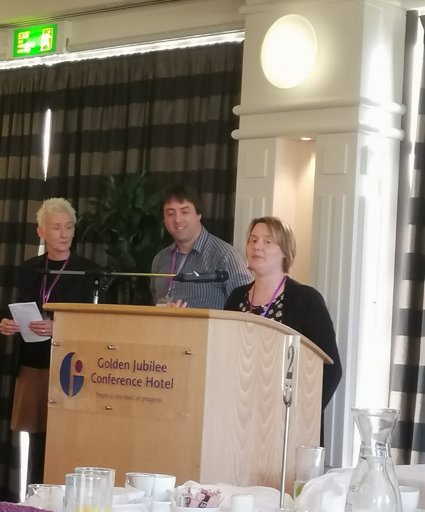 Left to right: MC Muriel Grey, Allen Stroud and Ruth EJ Booth giving her acceptance speech