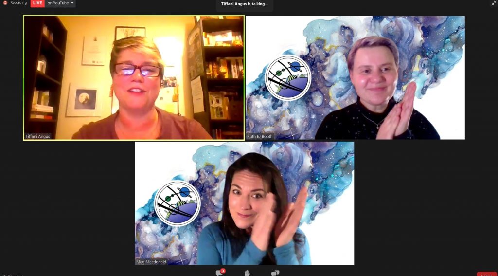 Screenshot from the Tiffani Angus interview. Top left is Tiffani Angus in front of some bookshelves. Top right is Ruth Booth clapping in front of a backdrop with the Glasgow in 2024 logo and a watercolour of a nebula. Botton centre is Meg MacDonald clapping in front of the same nackdrop.